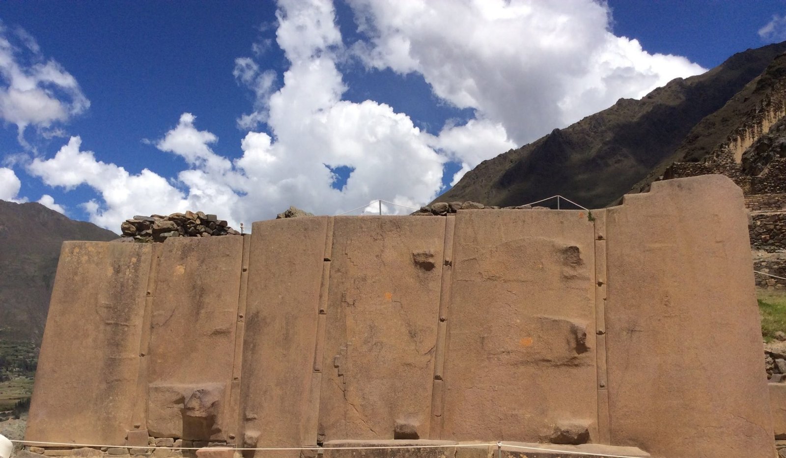 the wall of the six monoliths in ollantaytambo, peru