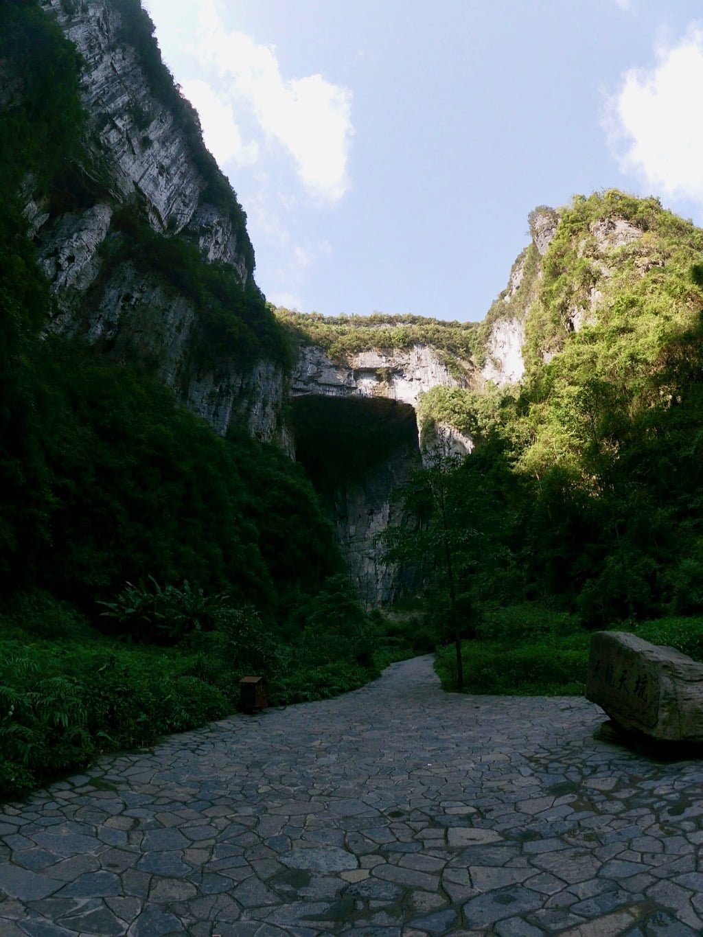 Three Natural Bridges in Wulong, Chongqing, China: natural limestone bridges featuring a well-maintained pathway