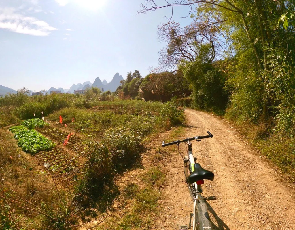 Cycling in Yangshuo, China | Biking the 10-Mile Gallery is a must-do if you're in the Guilin area of China. Yangshuo is a quick bus or train ride away, and offers beautiful views of the karst landscape.