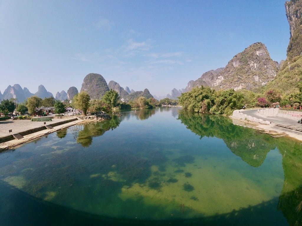 A view of the lake and hills from Gongnong Bridge in Yangshuo