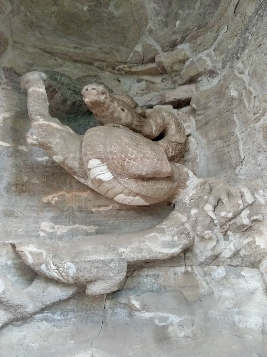 A dragon carving at Nanshan rock carvings in Dazu, influenced by Taoism