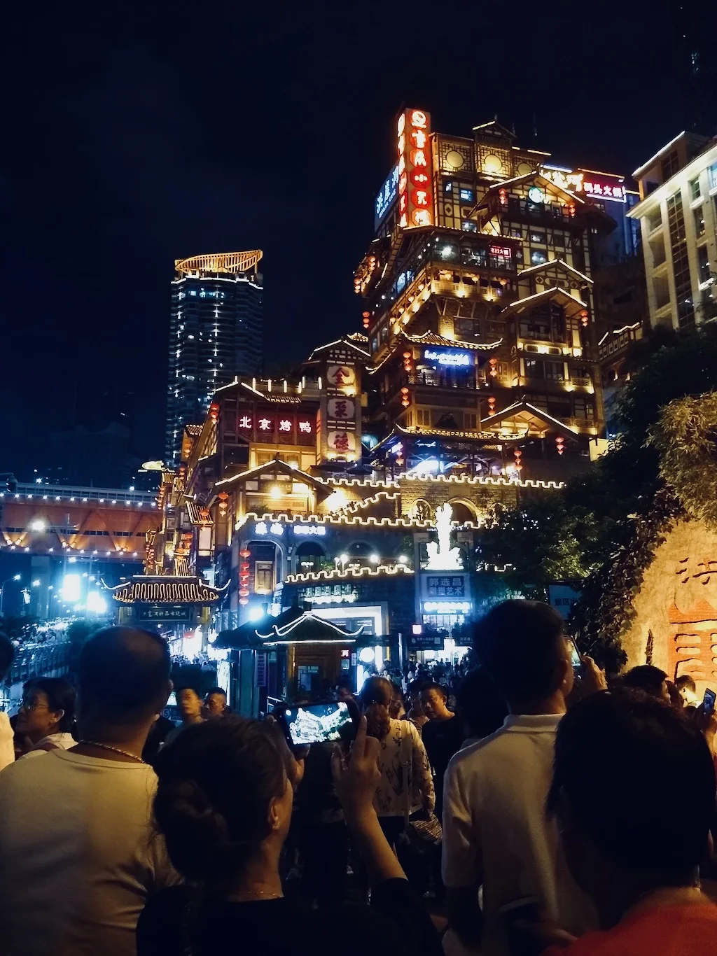 Hongya c cave in Chongqing, lit up at night; one of the major travel attractions in Chongqing city